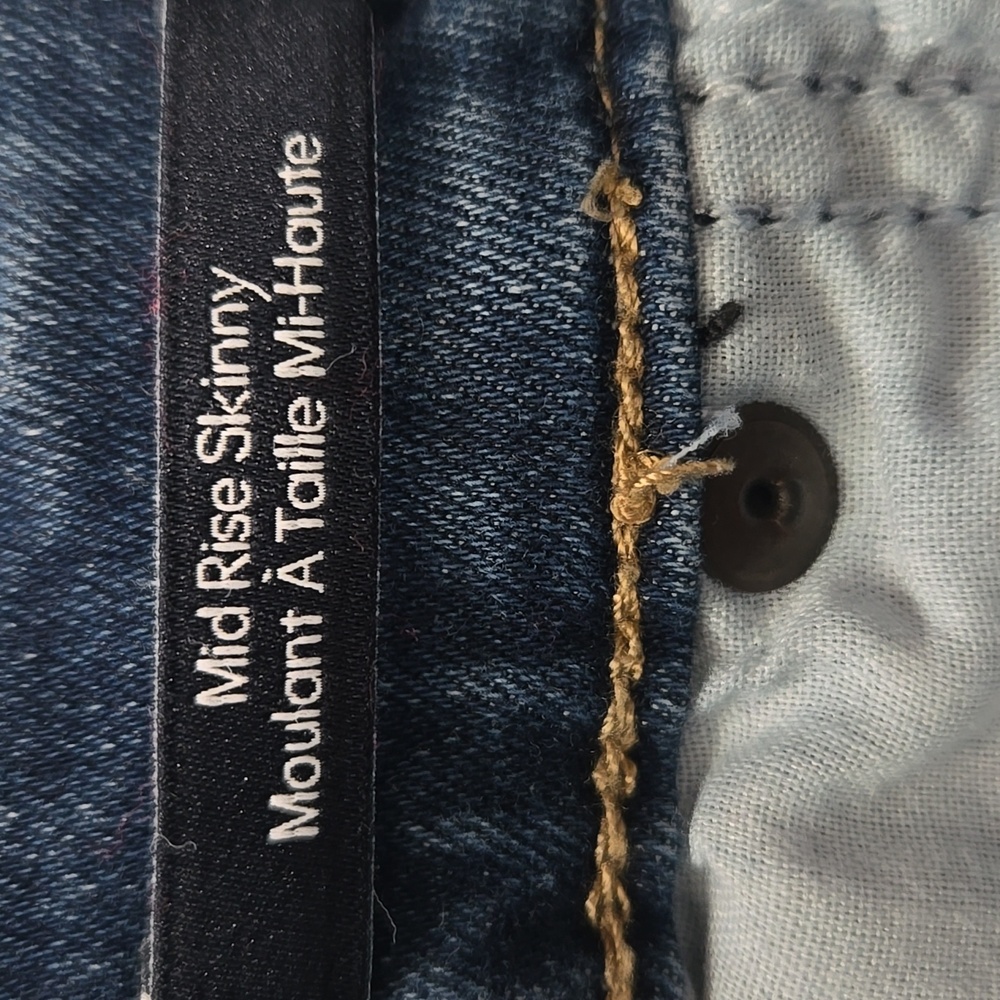 Calvin Klein Blue Mid Rise Skinny Jeans with Subtle Fading - Picture 7 of 7